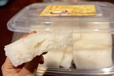  A close-up of a slice of Lunjiao Cake, showing its characteristic texture and striations