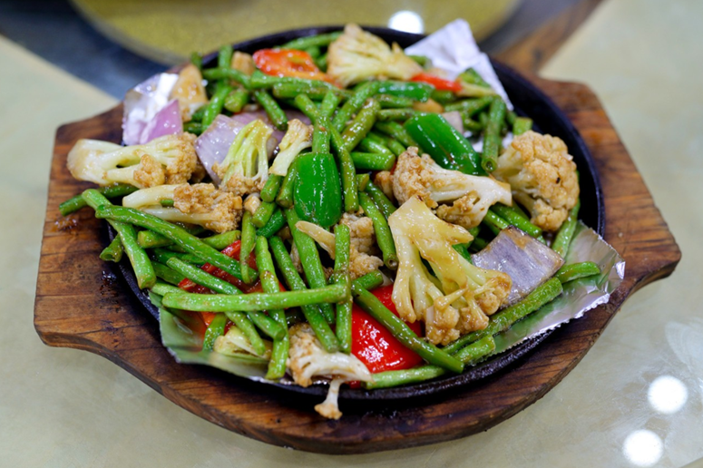  A dish of stir-fried Long Beans and Cauliflower with Shrimp Paste