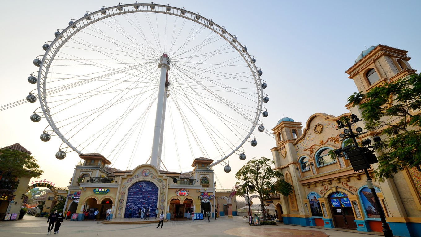  A vibrant shot of OCT Harbour PLUS, perhaps showing the theme park rides or the distinctive architecture