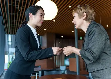 Business card exchange between Chinese and foreign executives