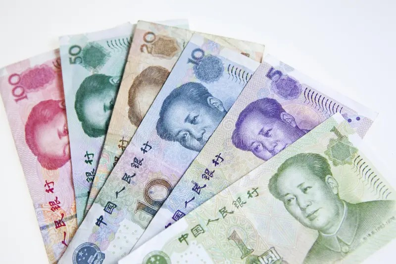 Chinese Yuan (RMB) banknotes of different denominations arranged neatly