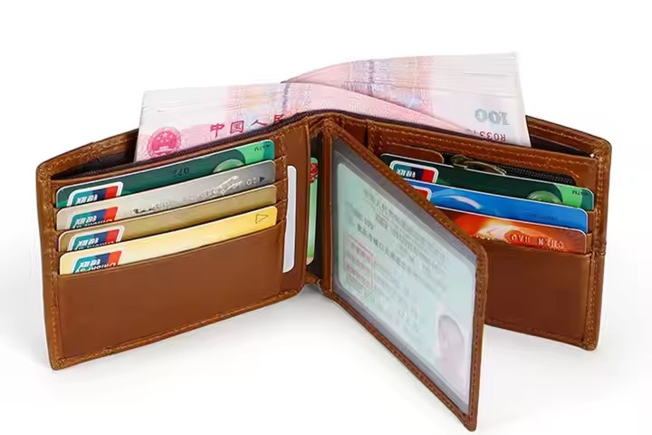 Chinese Yuan banknotes and coins with credit cards