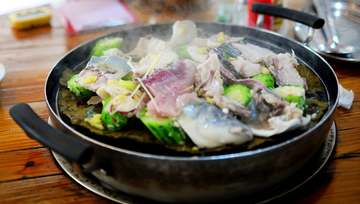  Close-up of a beautifully presented Shunde dish, perhaps steamed fish