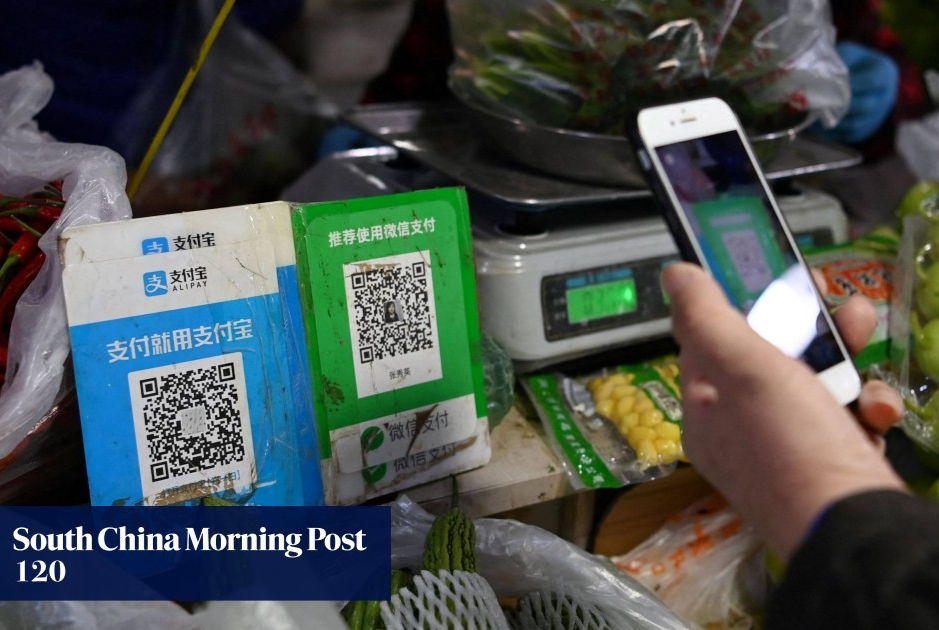 Street vendor accepting mobile payment via QR code scan