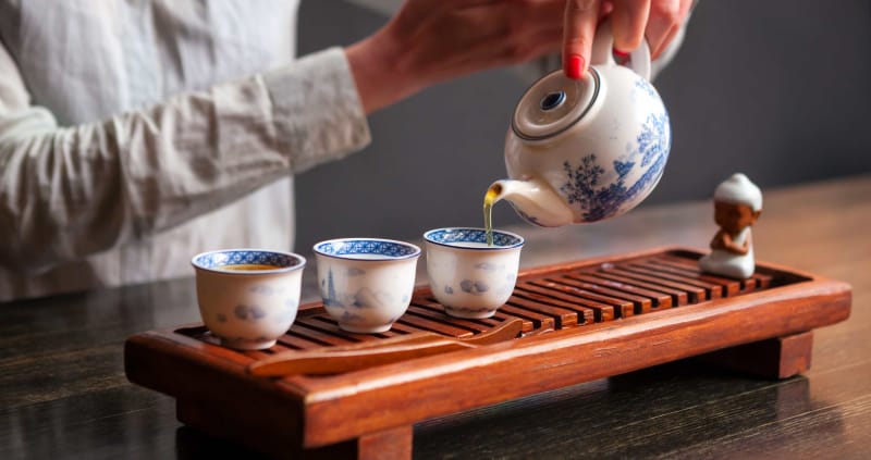 Traditional Chinese tea ceremony showing relationship building through shared activity