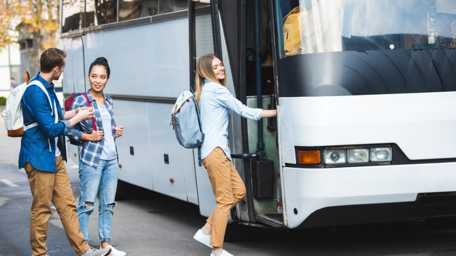 Travelers boarding a long-distance bus in China