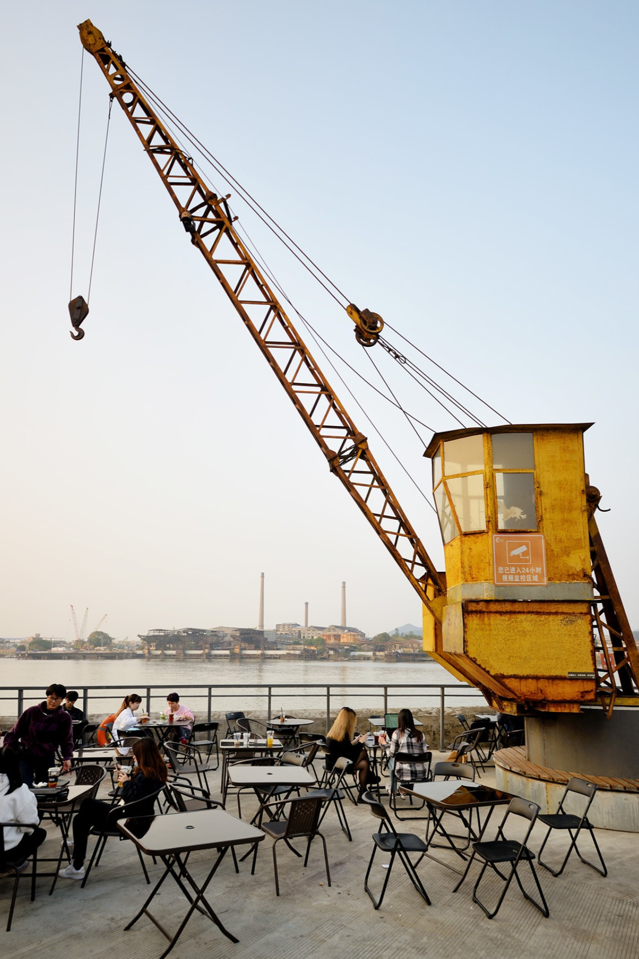  Vertical shot of a distinctive feature at Fisherman's Wharf, like a repurposed crane or a unique shopfront