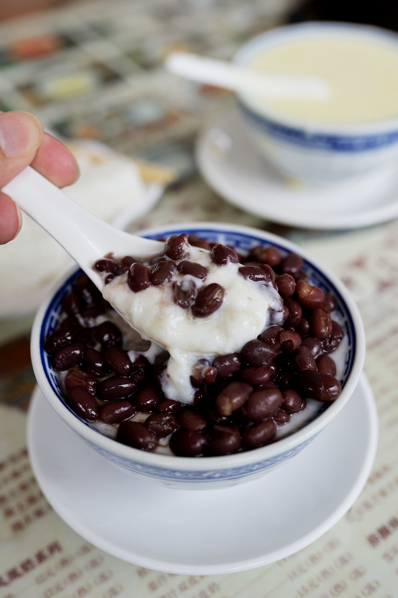  A tall glass or bowl of Granny Zhou's Red Bean Double-Skin Milk
