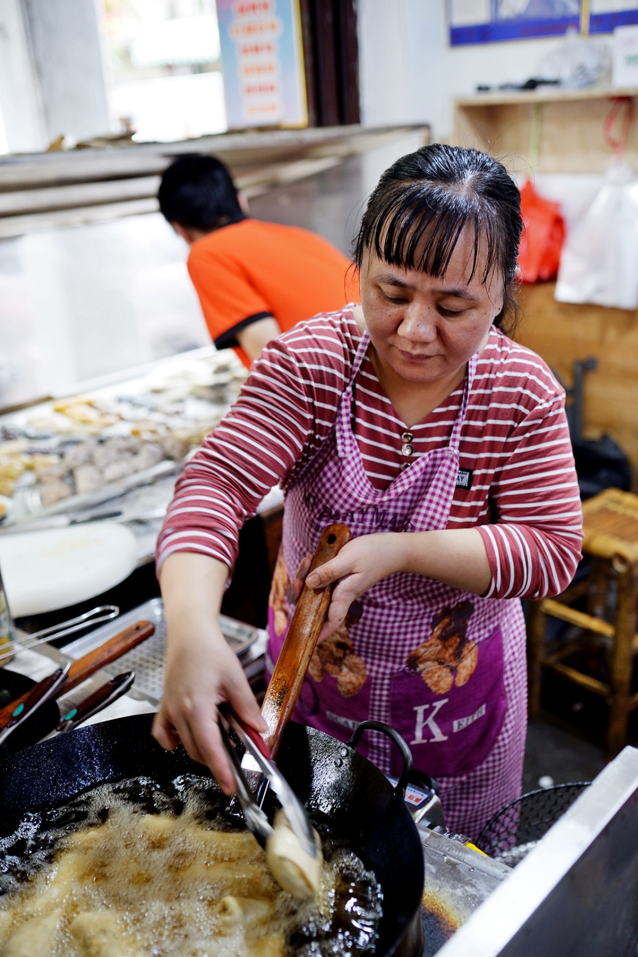  A vertical shot of the incredibly simple Yongji storefront