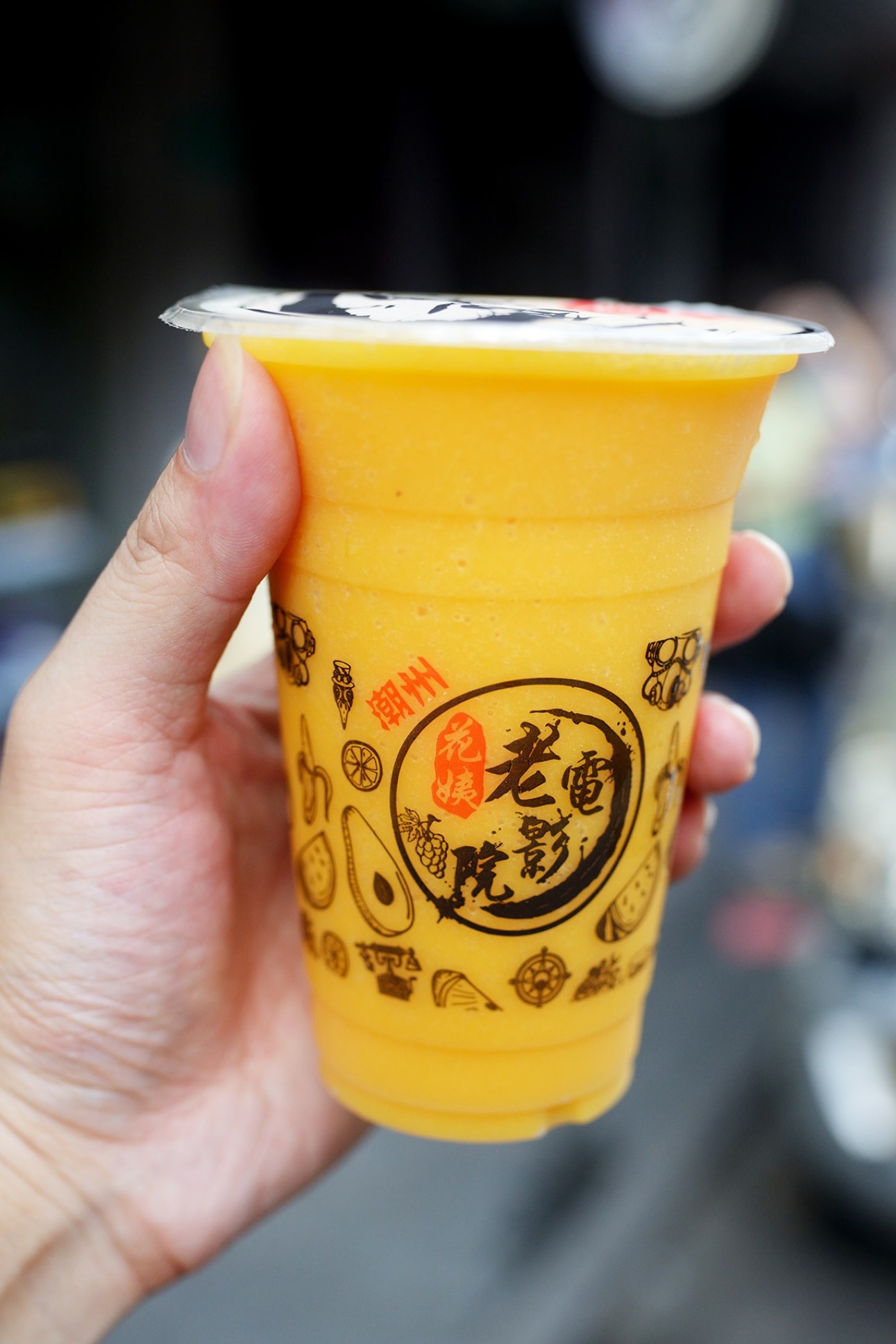  tall cup of mango juice ice