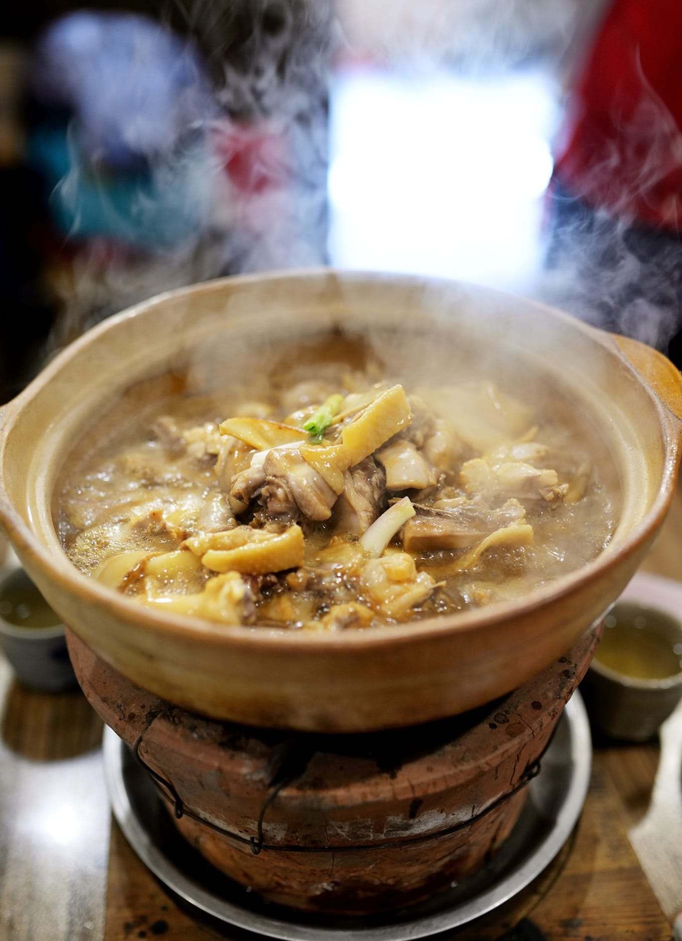 Claypot golden abalone snail chicken with tender meat and clear broth