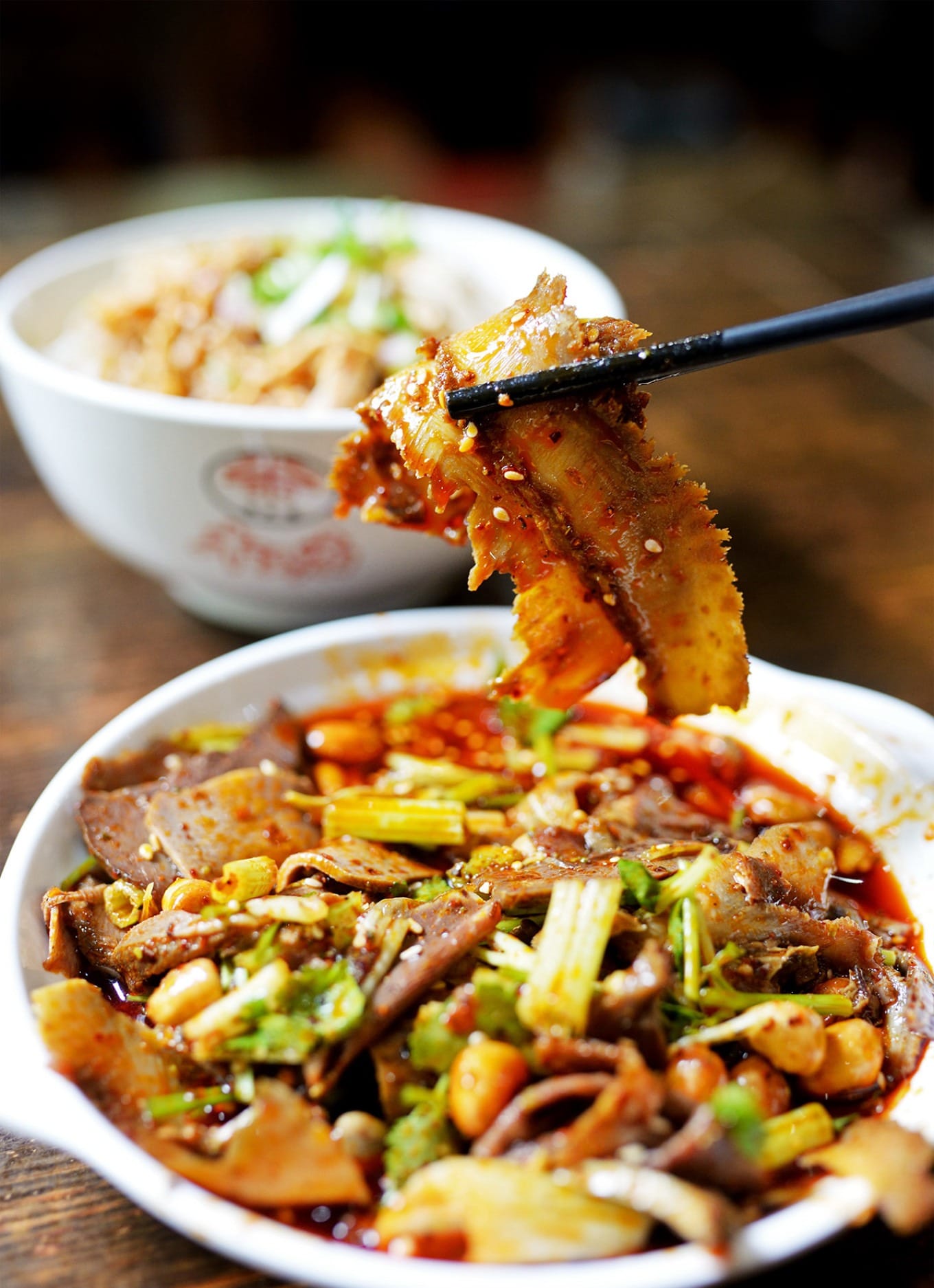 Close-up of fuqi feipian with glossy red oil and tender beef textures