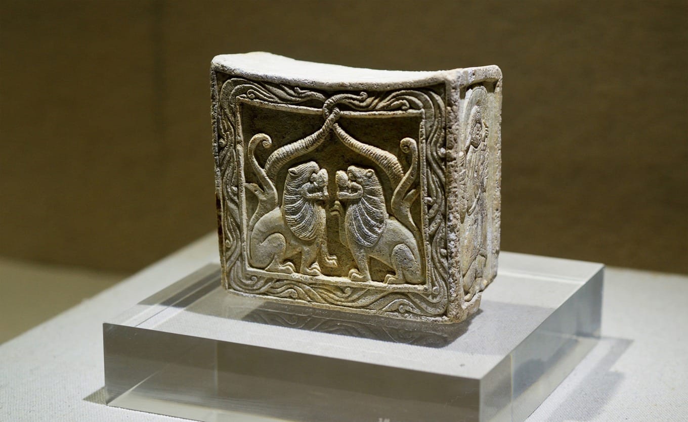 Northern Dynasties stone pillow carved with twin lions and foreign figures