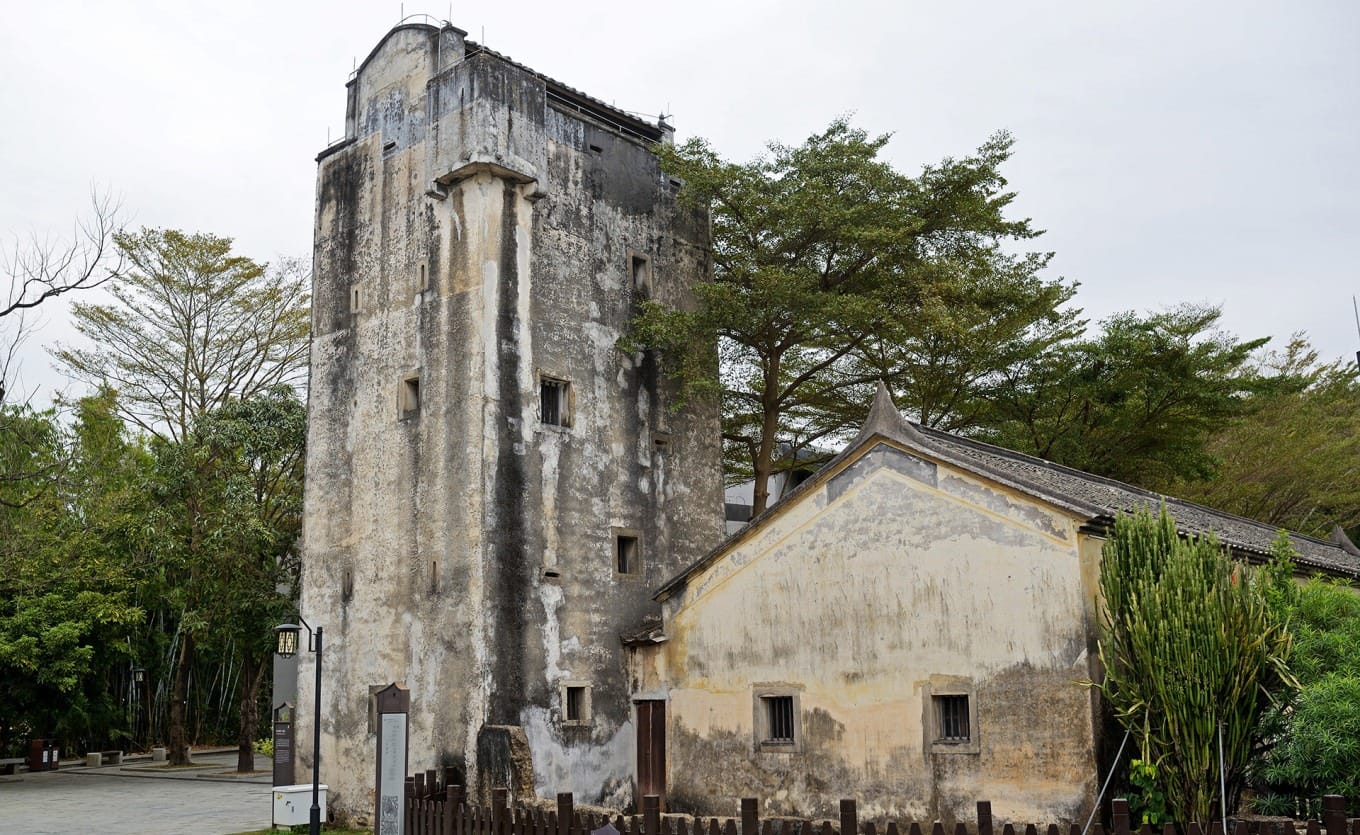 Historic Chen Clan watchtower with defensive firing holes in Guanlan Printmaking Village