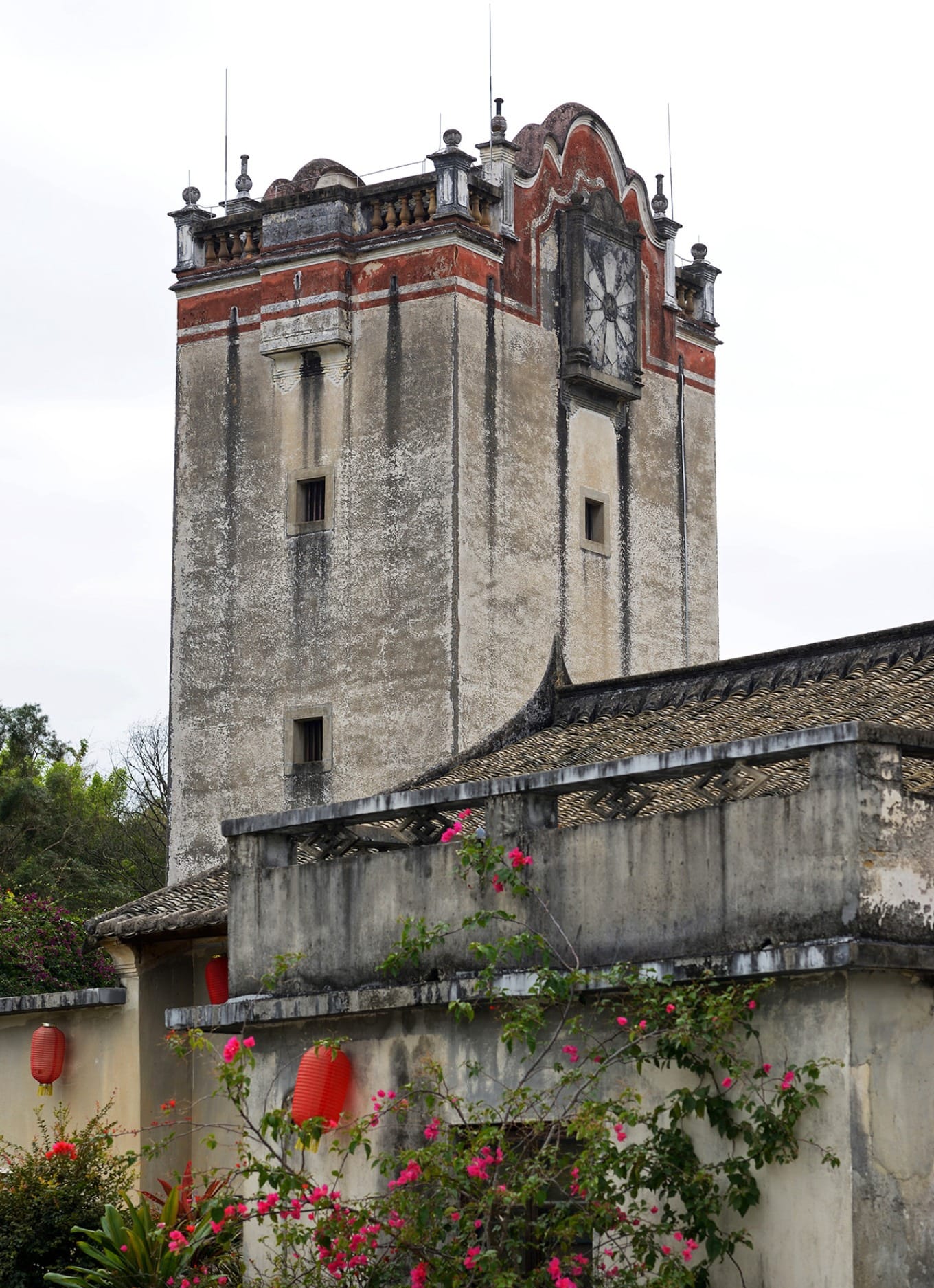 View of historic watchtower in Guanlan Printmaking Village under peaceful surroundings