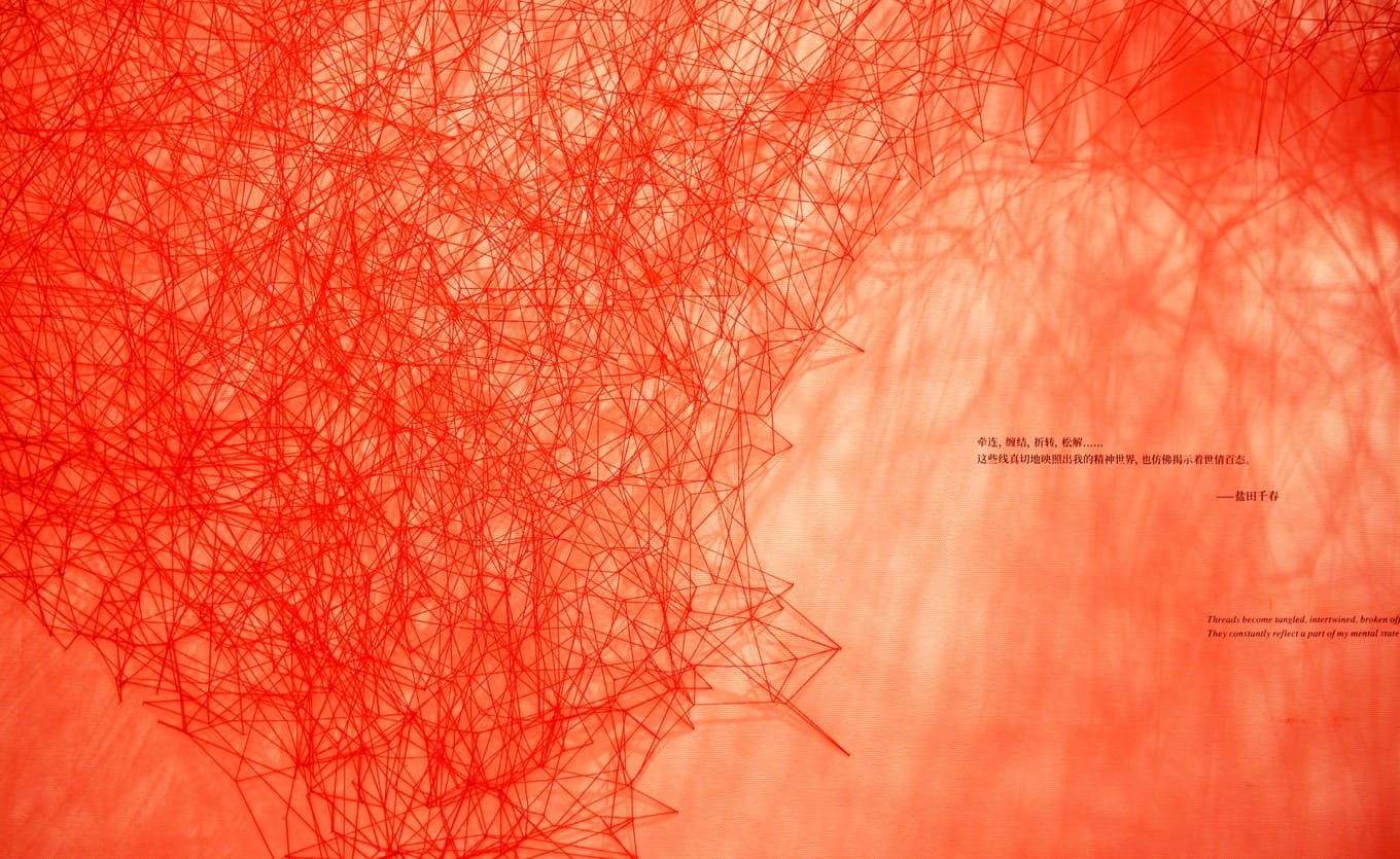 Red thread installation Uncertain Journey by Chiharu Shiota