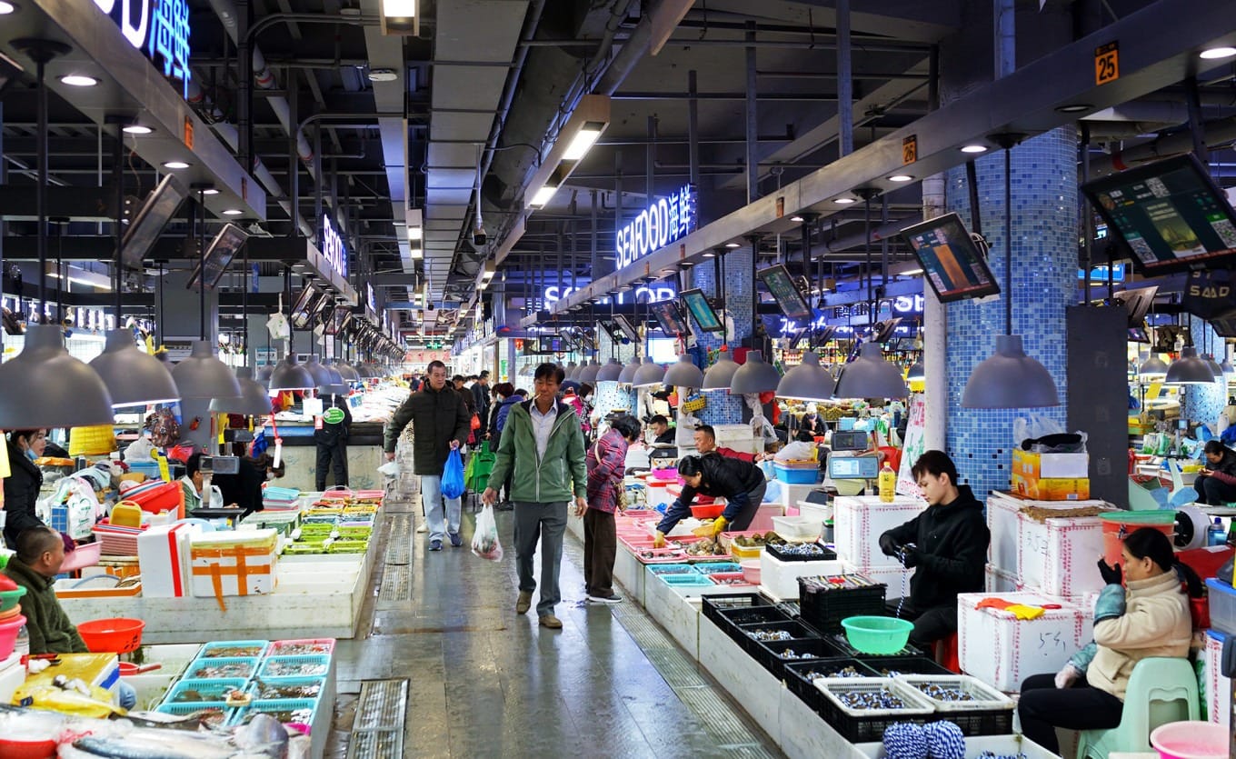 Wide interior view of Shekou Market showcasing abundant seafood stalls