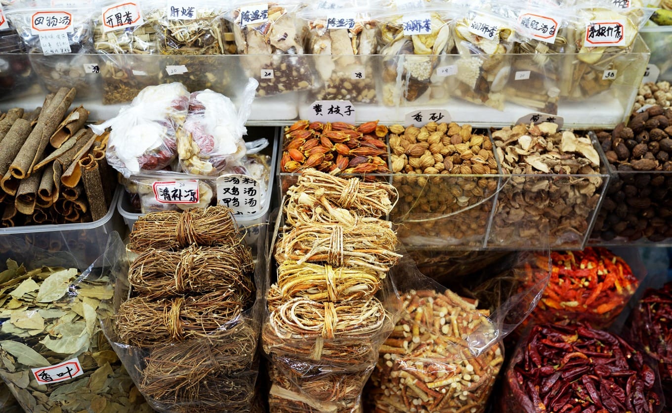 Shelves of dried herbs and soup ingredients at Shekou Market
