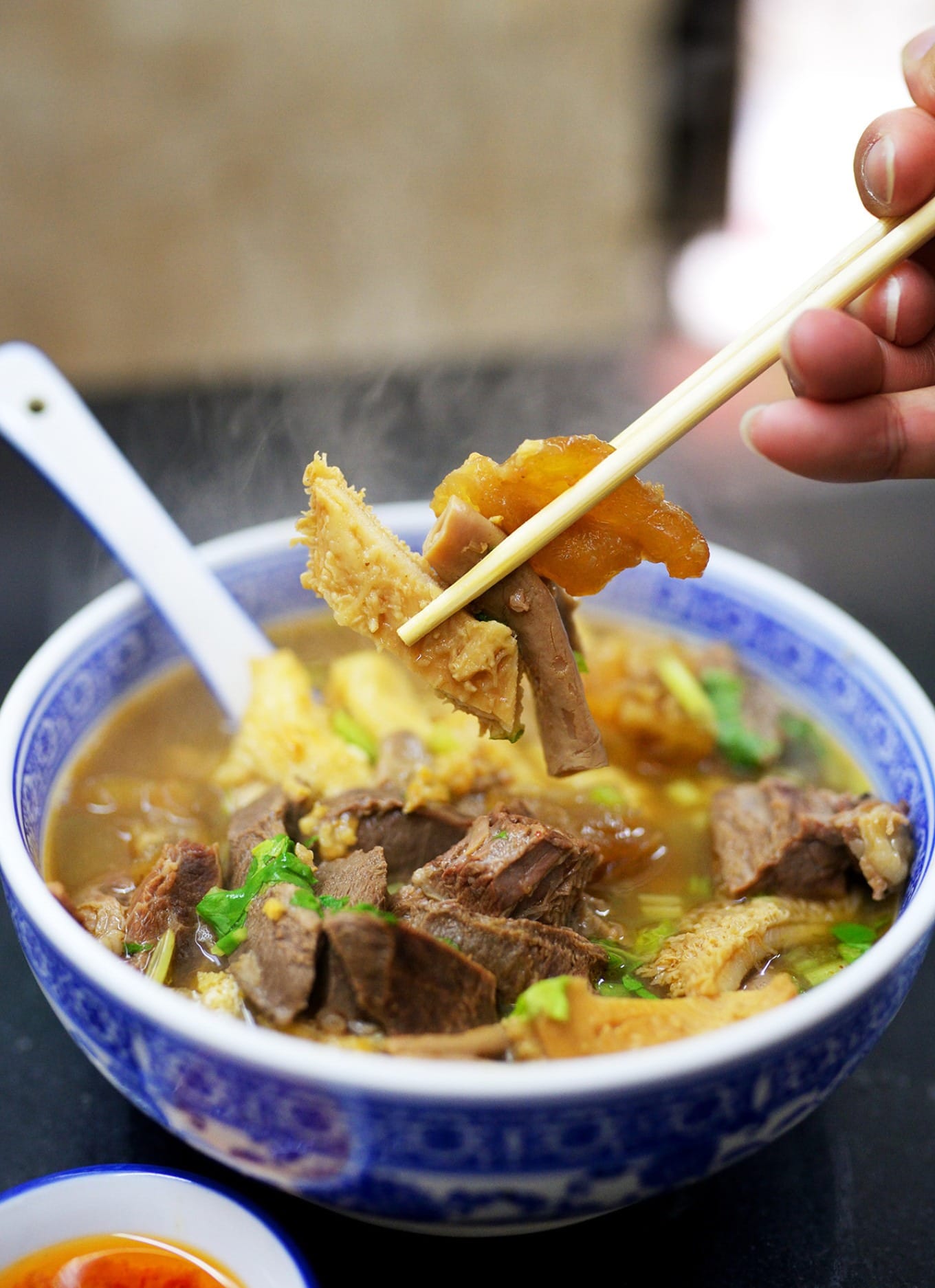 Close-up of assorted beef offal cuts showing varied textures