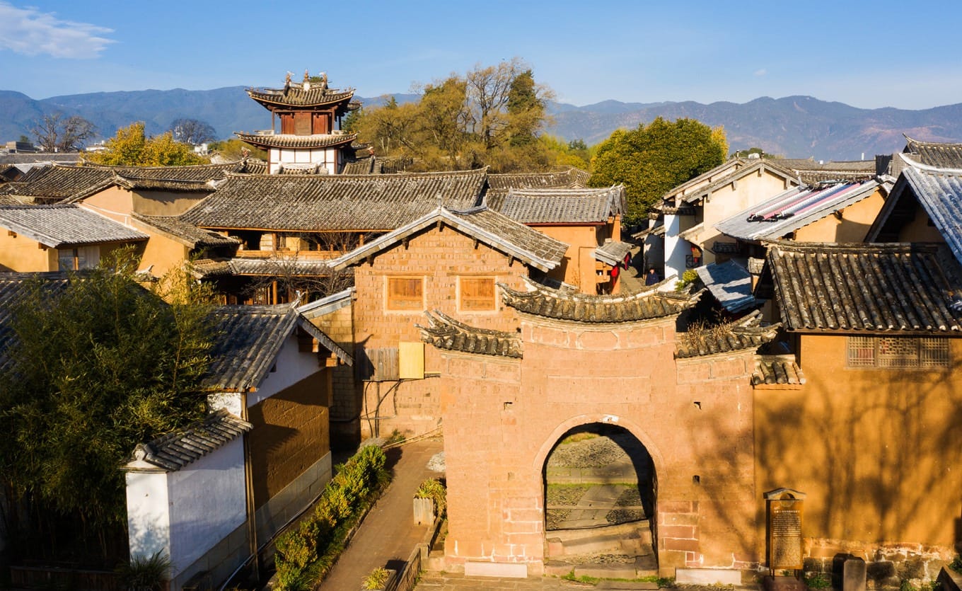 Aerial view of Shaxi ancient town surrounded by mountains