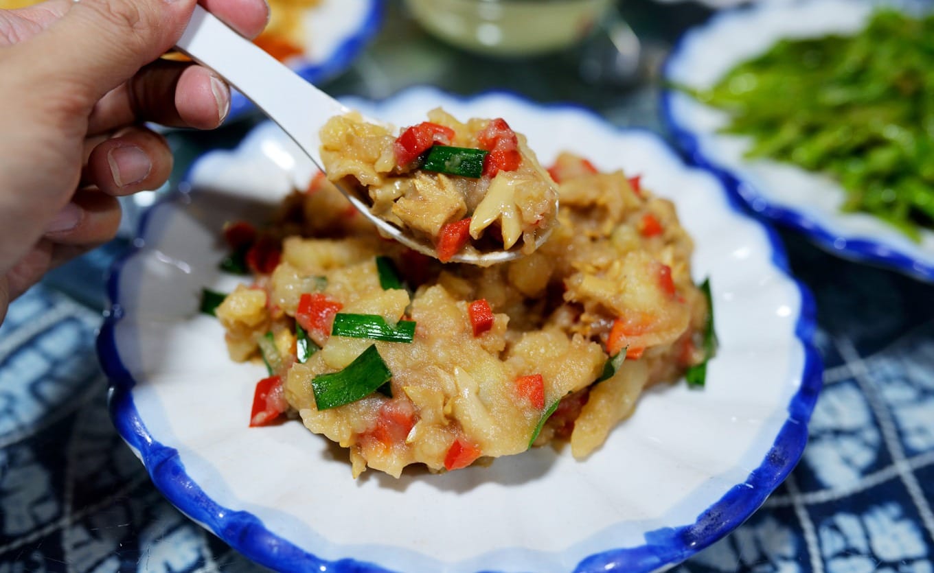 Interior view of Sifangjie Restaurant showing wooden tables and traditional decor