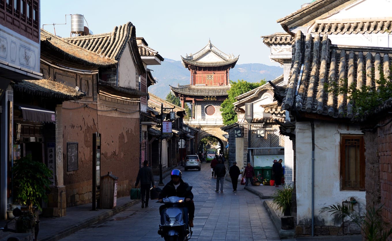 A colorful spread of local Dali cuisine dishes on a table