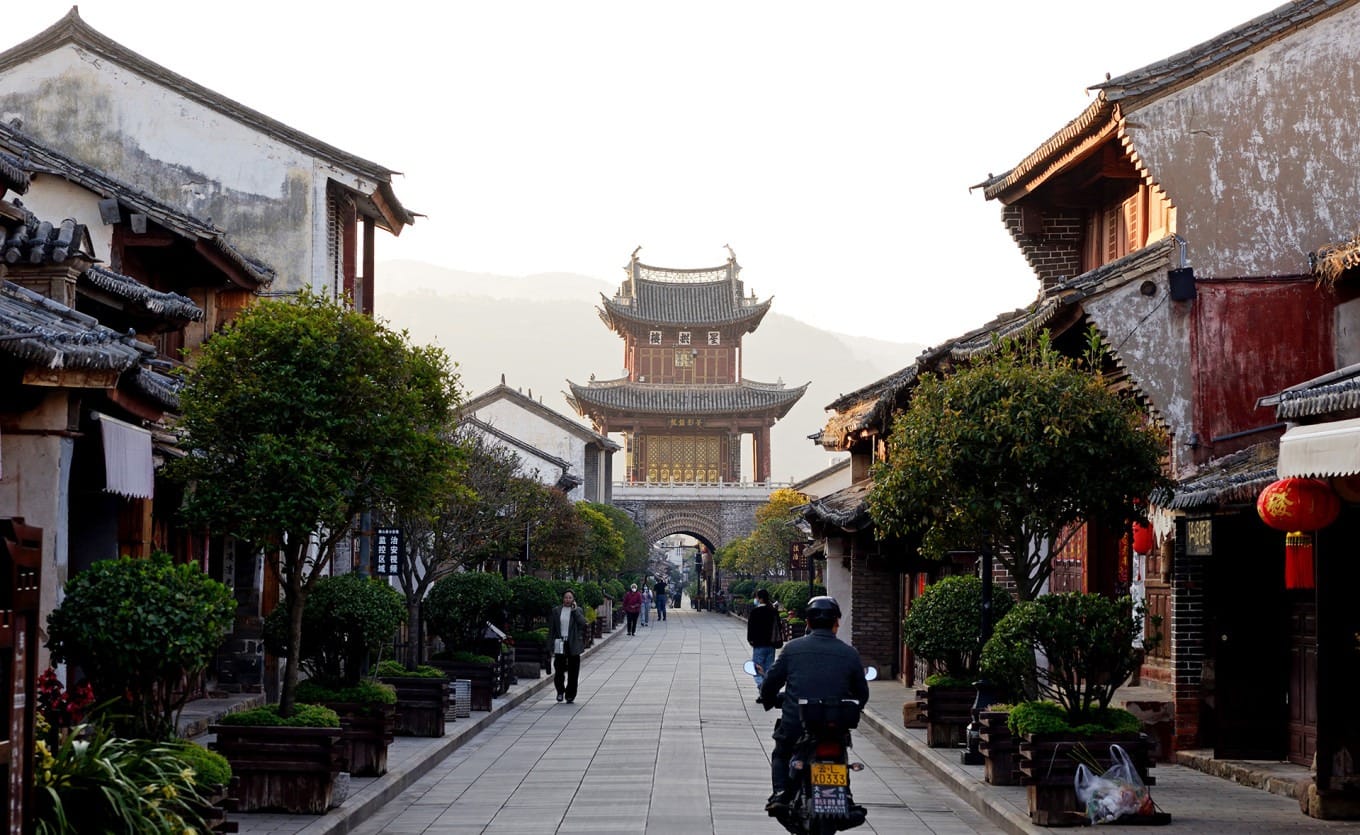 Detailed view of the brick-and-stone base supporting Xinggong Tower's wooden pavilion