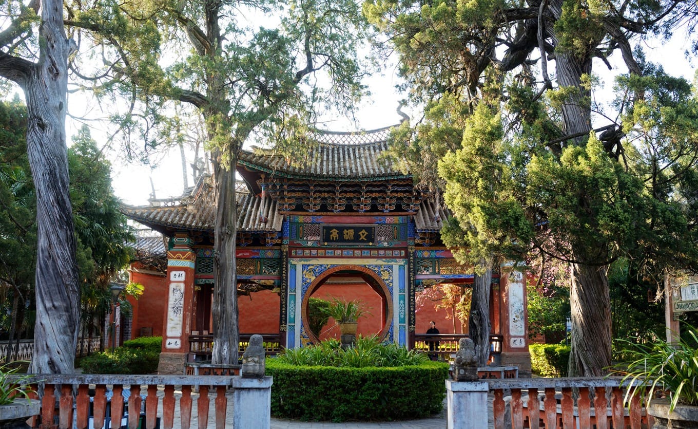 Close-up of Yanta Fang's detailed wooden carvings and roof structure