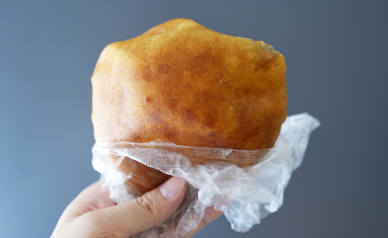 A display of various Hui snacks including oil-fried bread at Wencong shop
