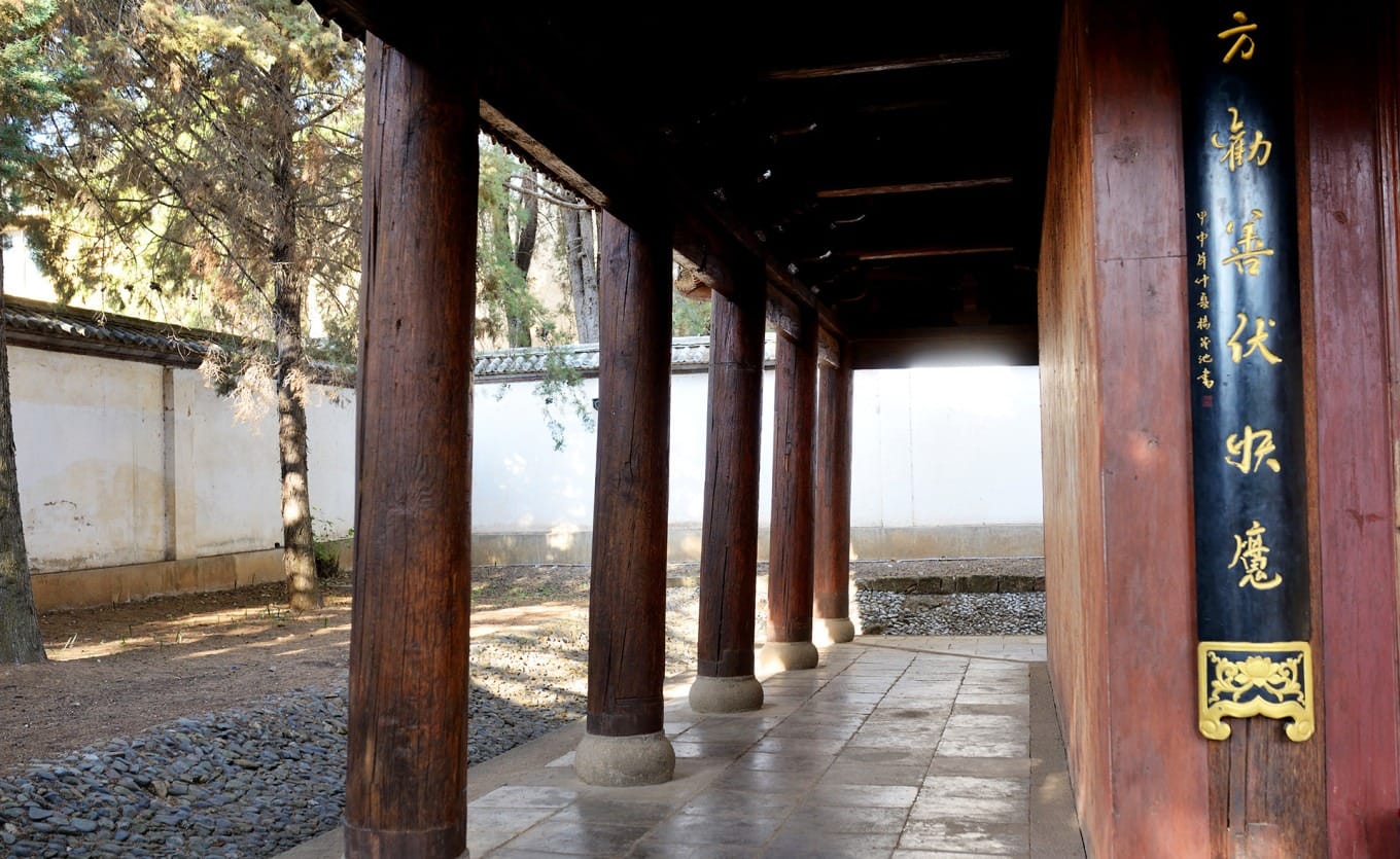Detailed mural depicting Buddhist deities with vibrant colors