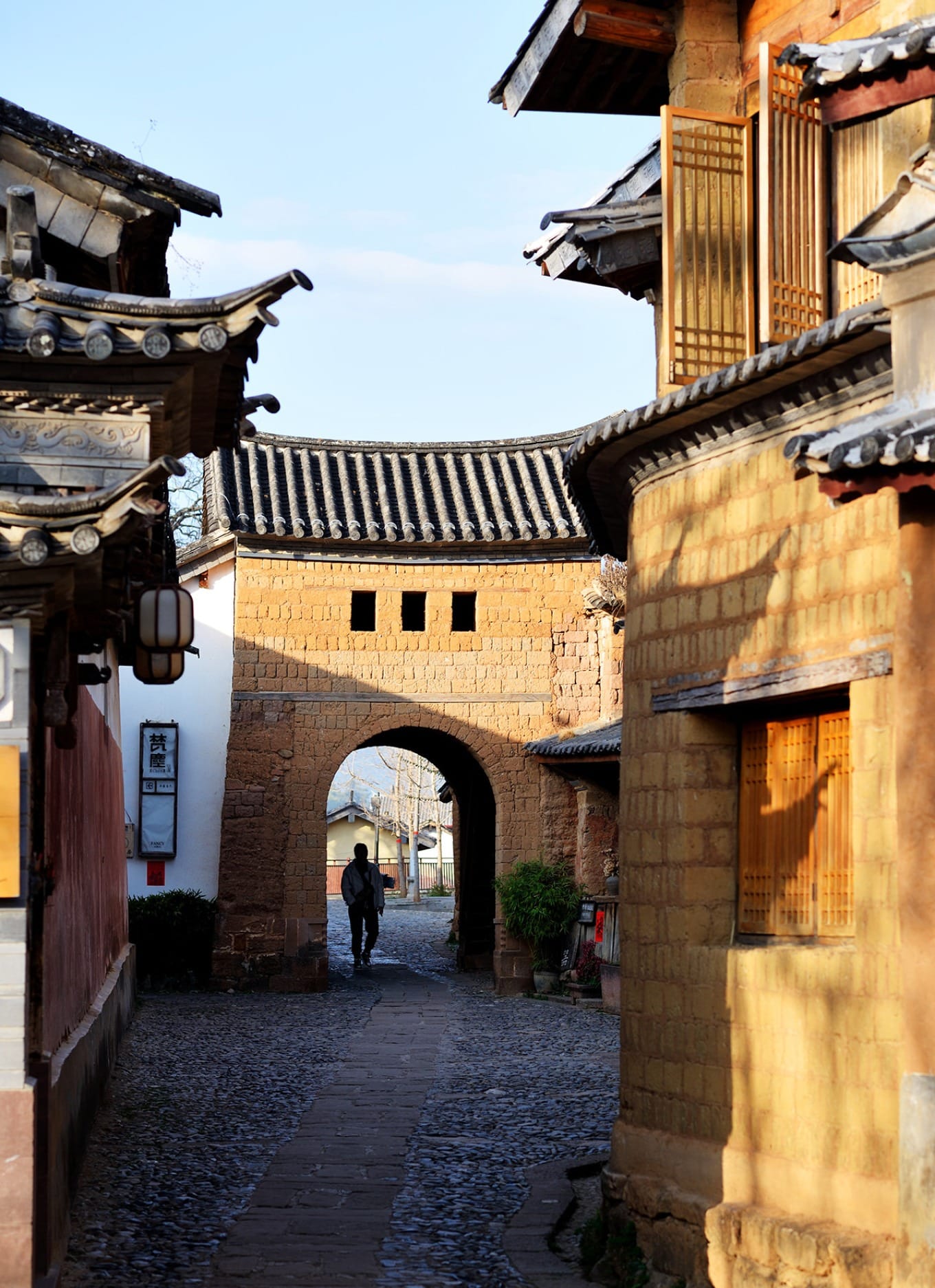 A peaceful, contemporary scene of Siden Street in Shaxi with few tourists