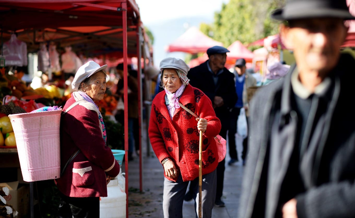 Panoramic view of Shaxi market with mountains in background