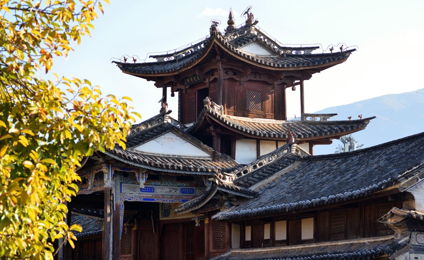 Golden wheat fields swaying in the wind in Xizhou, creating a romantic scene