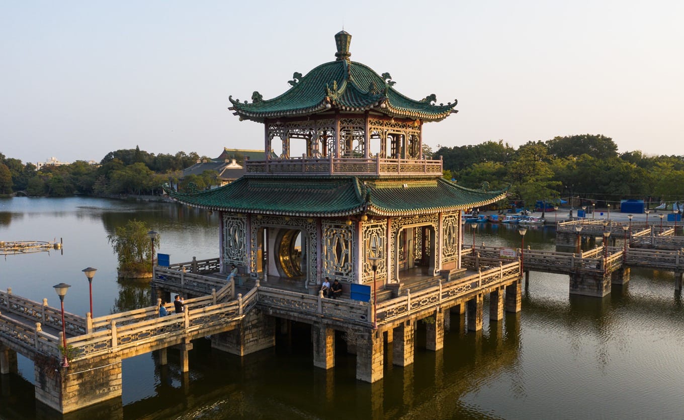 Traditional Nine-Turn Bridge leading to the double-story pavilion at West Lake