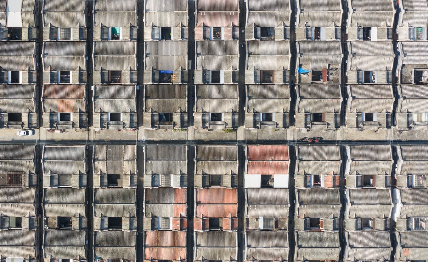 Aerial view of geometric traditional housing layout in Nigou Village