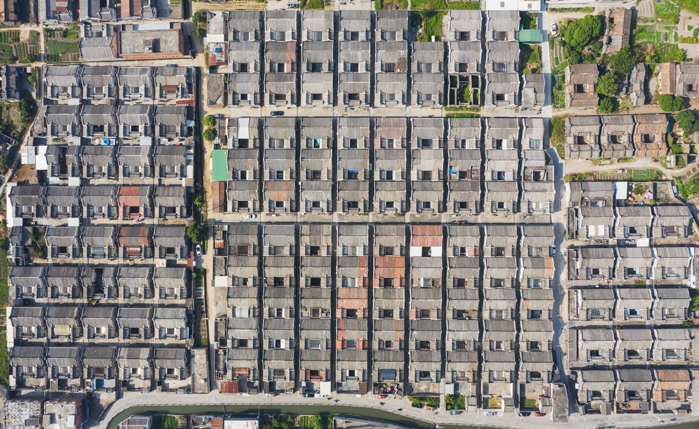 Canals and water channels dividing residential areas in Nigou Village