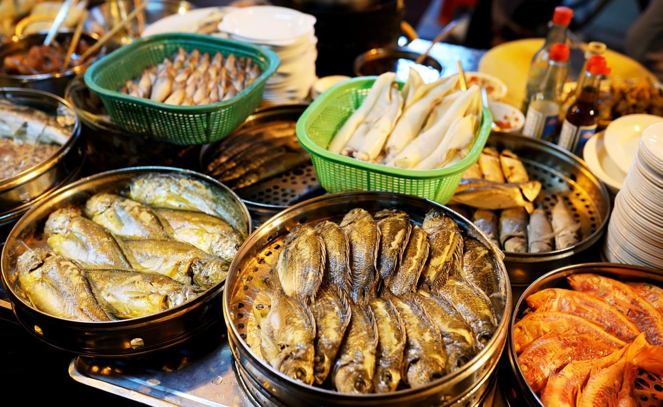 Traditional Teochew fish rice preparation displayed on counter
