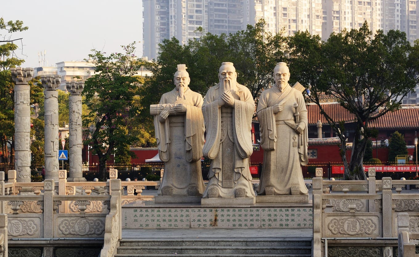 Interior architectural details of Dacheng Hall with golden columns and carved beams