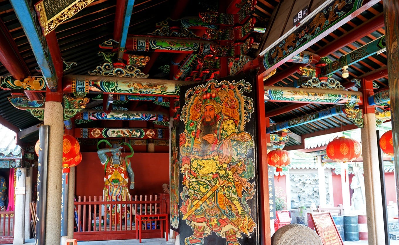Front hall entrance with painted door gods and traditional inscribed couplets