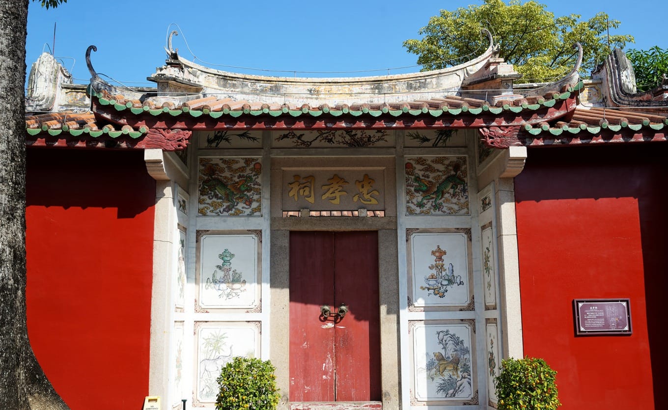 Vermillion-painted corridors and side buildings of the temple complex