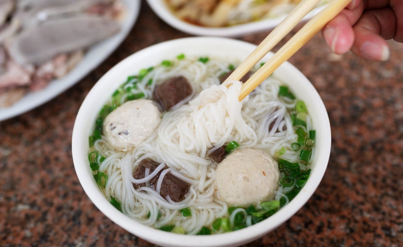 Bowl of Tongkeng rice noodle soup with hand-pounded goose meatballs