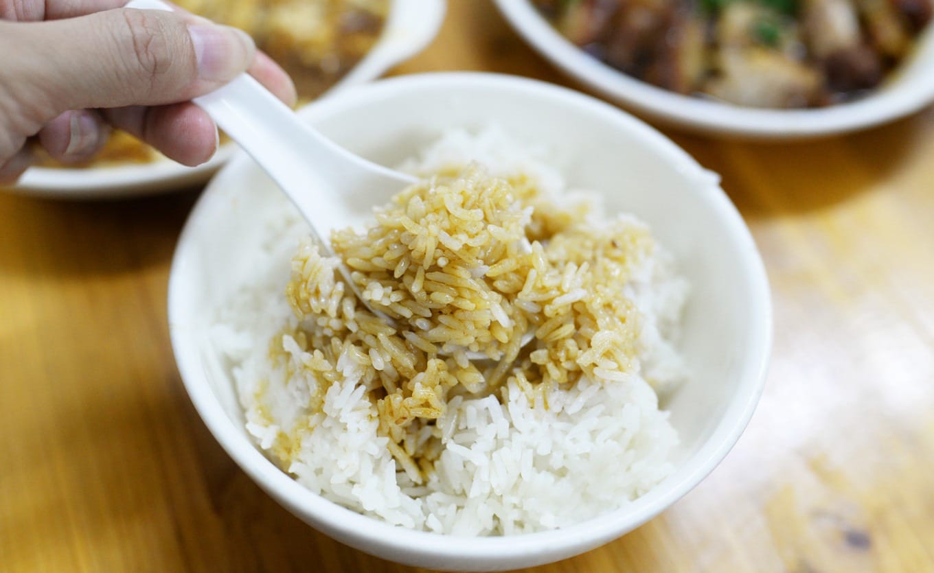 Rice bowl topped with rich pork knuckle gravy and sauce