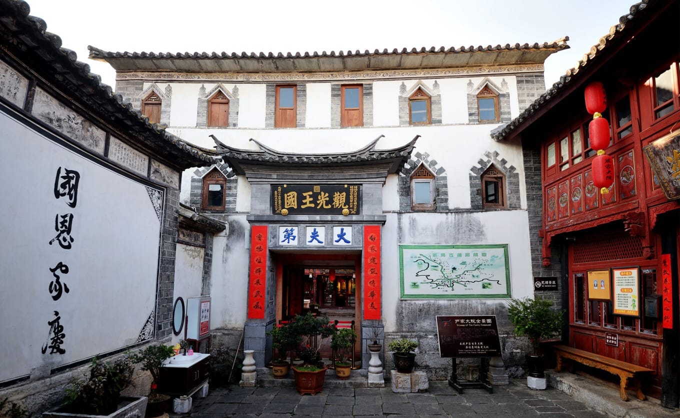 The weathered stone ruins of the Flying Tigers navigation station building with a partially collapsed roof