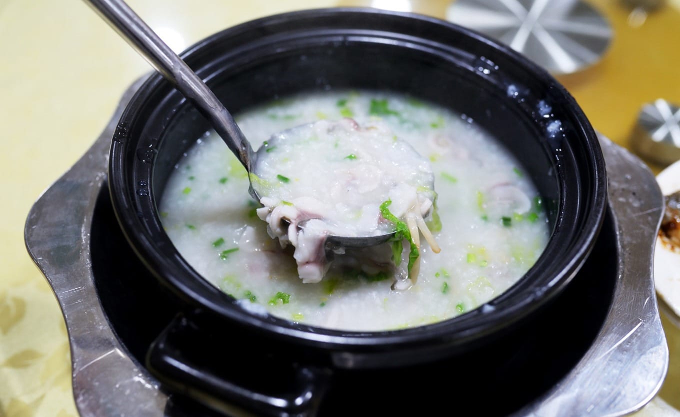 Raw crucian carp slices ready to be cooked in porridge