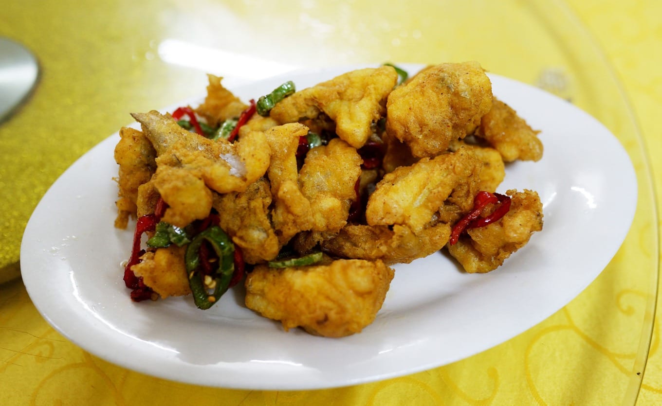 Spicy Salt Codfish dish served at Xinwan Feiyi Chicken Pot
