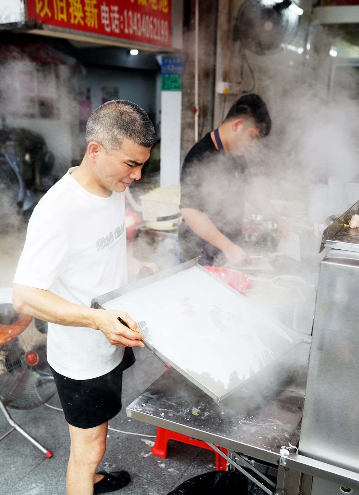 Mastering the art of making cheong fun at Ziyuan Snack Shop