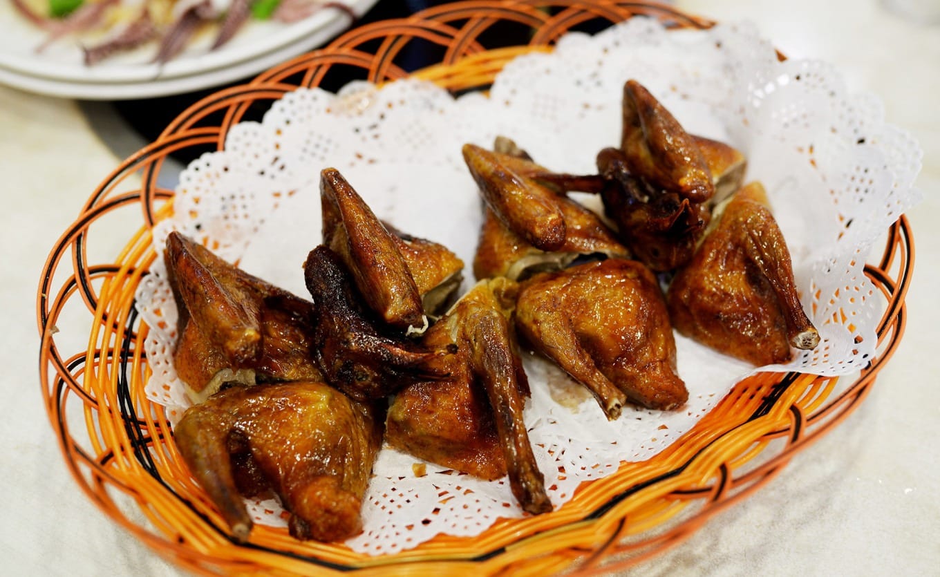 A close-up of the braised pigeon dish