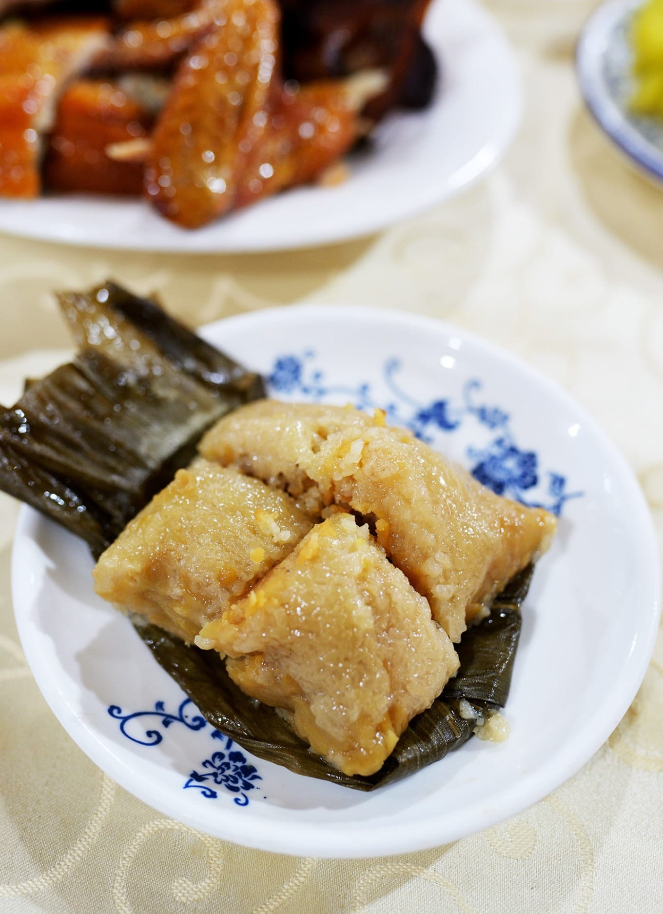A close-up of the salted egg yolk and mung bean zongzi, a traditional delicacy