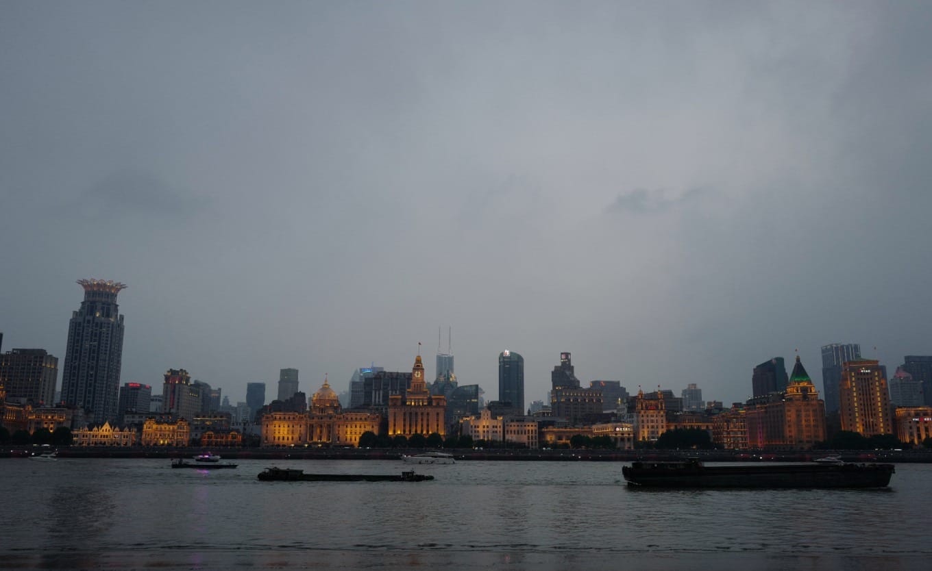 Shanghai's modern skyline including Oriental Pearl Tower at blue hour