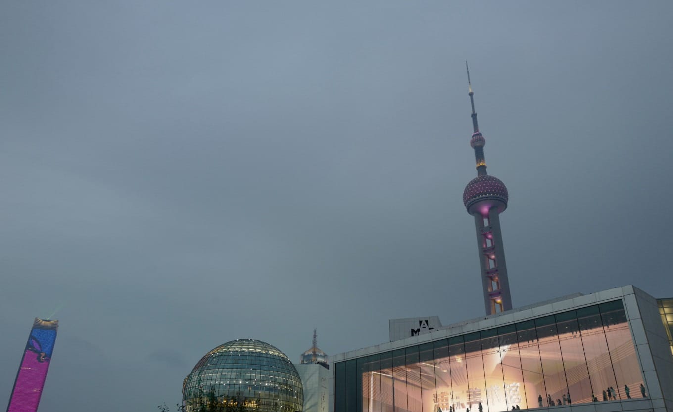 Shanghai skyline showing historic Bund buildings and modern Pudong towers together